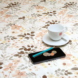 Acrylic Coated Tablecloth - Living:  Autumn Flowers - pictured with a cup and saucer, 'phone, pen and coins.
