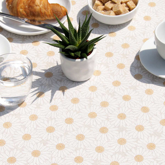 Wipe Clean Tablecloth - Mirha Daisy Bloom on round table with cups and plates etc.