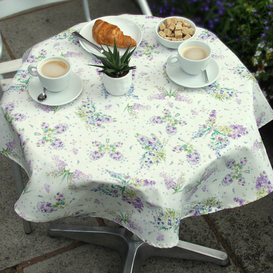 Wipe Clean Tablecloth - Blaze: Floral Butterflies on a small bistro style table