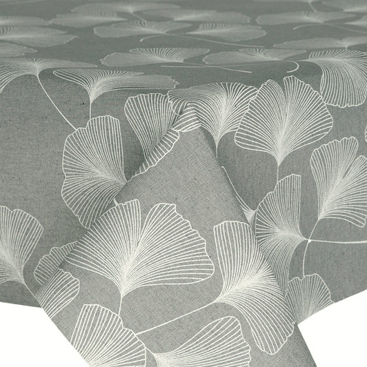 Acrylic Coated Tablecloth - Culla: Ginkgo in Grey. Shown on a table.