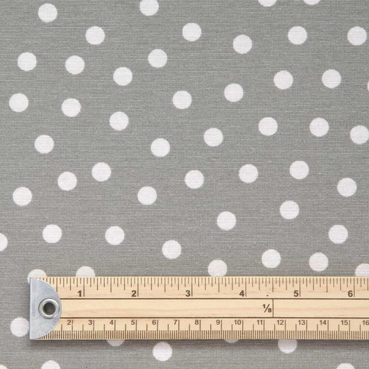 Wipe Clean Fabric Loneta Fantasy Dots - Grey.  Pictured with a wooden ruler