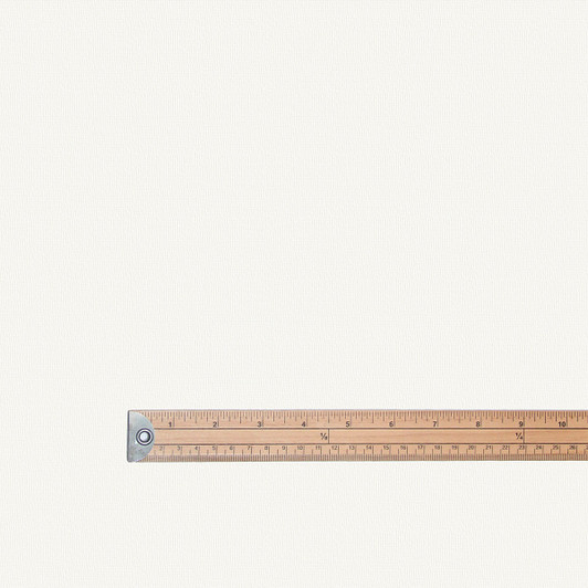 Wipe Clean Fabric - Blaze: White. Pictured with a metre rule to show scale