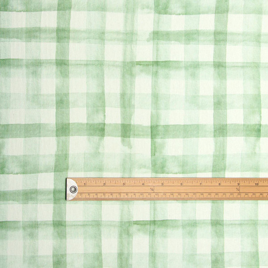 Navarra: Green Plaid.  Wipe Clean Fabric, pictured with a wooden rule to show scale.
