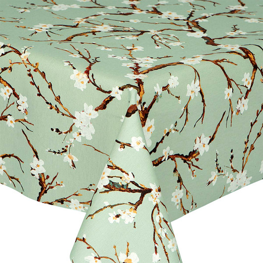 Living Sakura: Acrylic Coated Tablecloth. Shown on a table