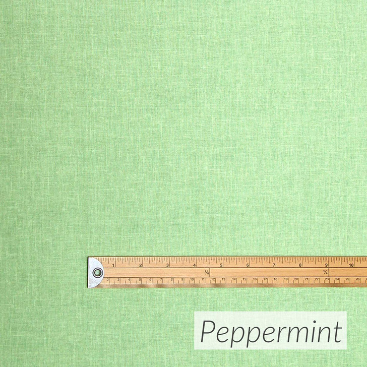 Living Weave fabric in Peppermint. Pictured with a wooden ruler to show scale