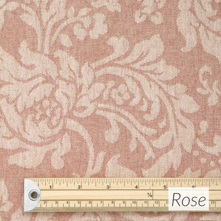 Catalonia Damask Acrylic Coated Fabric. Colour: Rose - pictured with a wooden rule.