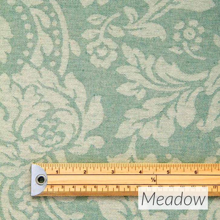 Catalonia Damask Acrylic Coated Fabric. Colour: Meadow - pictured with a wooden rule.
