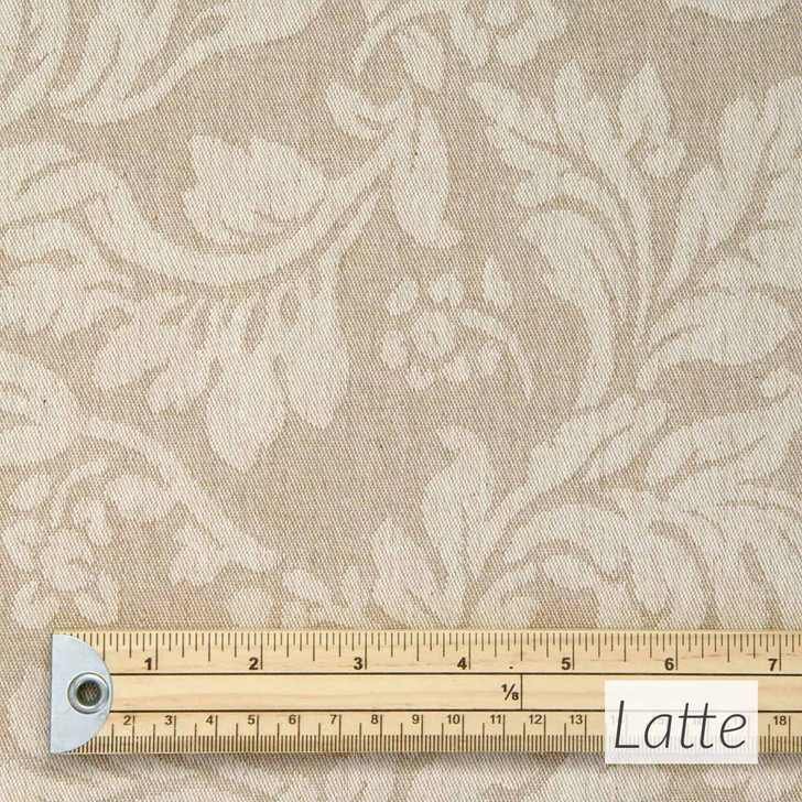 Catalonia Damask Acrylic Coated Fabric. Colour: Latte - pictured with a wooden rule.