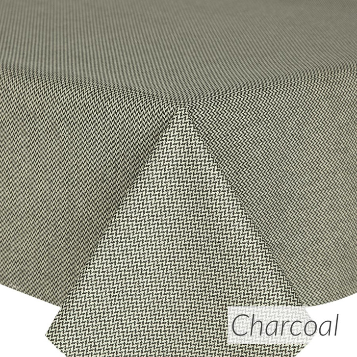 Catalonia: Herringbone - Charcoal - Wipe Clean Tablecloth - folded corner on table
