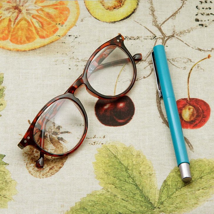 Acrylic coated tablecloth: Digital Harvest - pictured with a pair of glasses and a pen