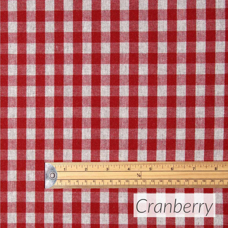 Wipe Clean Fabric- Mirha Yarn Dyed: Gingham Check - Cranberry. Pictured with a wooden ruler to show scale