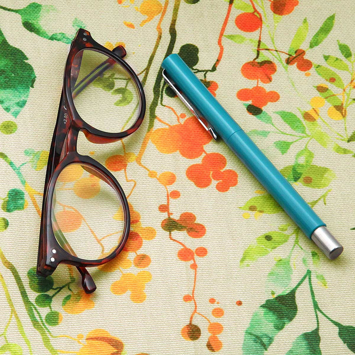 Acrylic Coated fabric. Digital Sofia - pictured with a pair of glasses and a pen