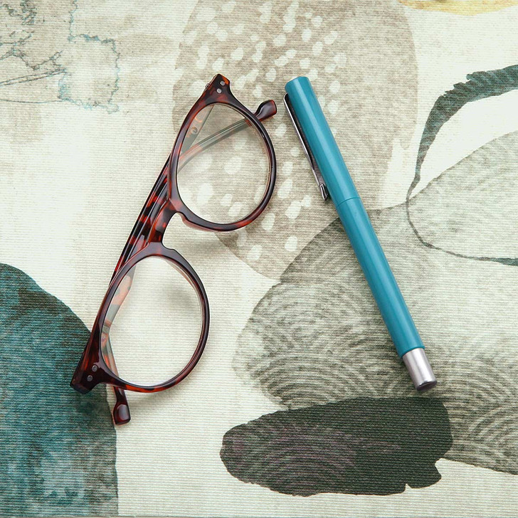 Wipe Clean Tablecloth - Digital Zen Garden. Pictured with a pair of glasses and a pen.
