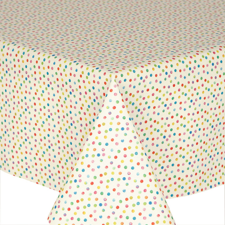 Navarra: Lina.  Wipe Clean Tablecloth, pictured on the corner of a table.