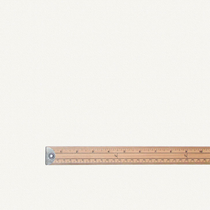 Wipe Clean Fabric - Blaze: White. Pictured with a metre rule to show scale