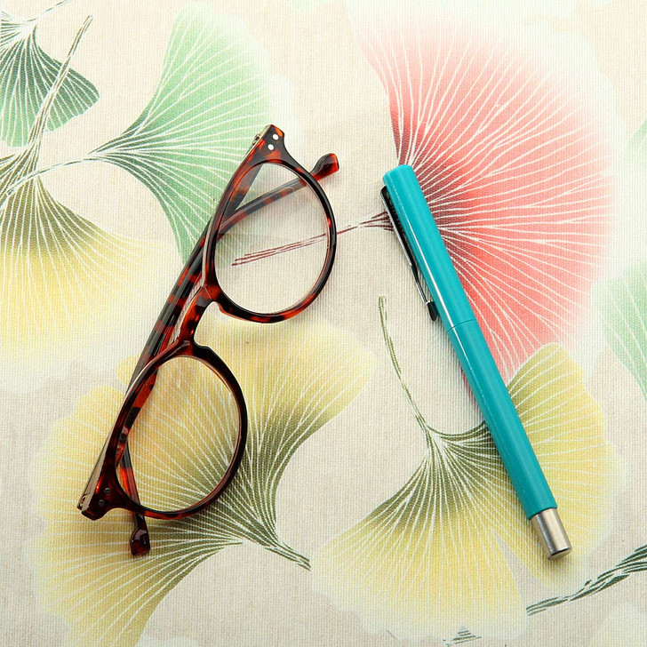 Wipe Clean Fabric. Culla: Verity - pictured with a pair of glasses and a pen.