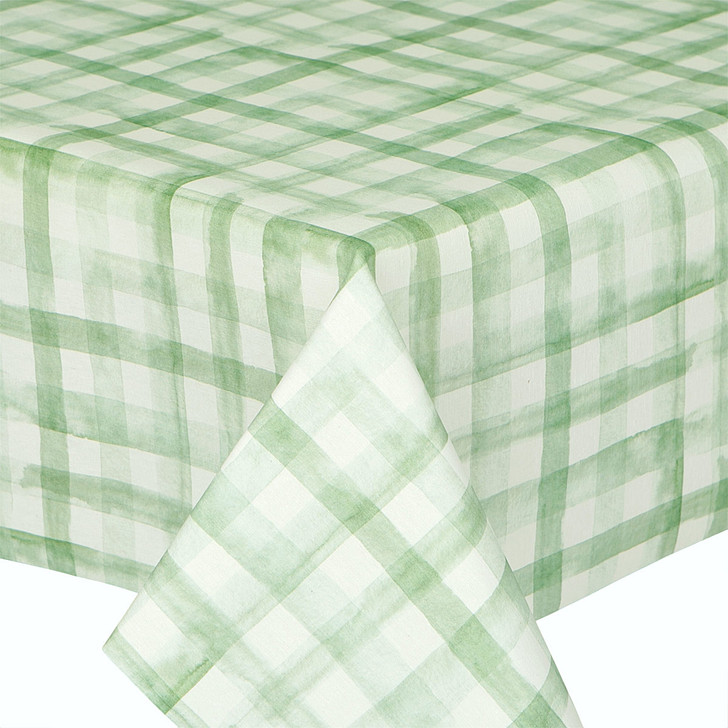 Navarra: Green Plaid.  Wipe Clean Tablecloth, pictured on the corner of a table.