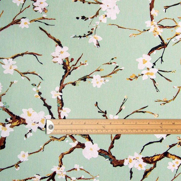 Living Sakura: Wipe Clean Fabric. Pictured with a wooden metre rule to show scale