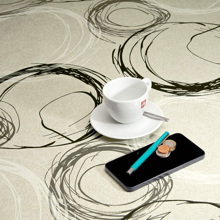 Wipe Clean, Acrylic Coated Tablecloth - Loneta: Turner. Pictured with cup and and saucer, 'phone, and pen.