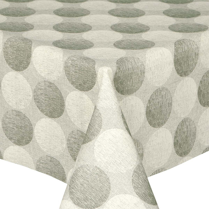 Living Circles Grey: Acrylic Coated Tablecloth. Shown on a table.