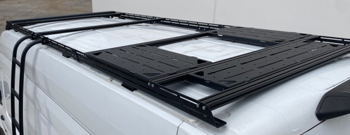 Ford Transit van featuring Cruiser Modular Roof Rack side view.