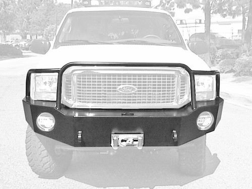 Close-up picture highlighting Aluminess Front Bumper on an Excursion van.