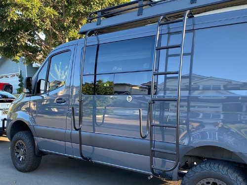 Black Mercedes Sprinter van featuring Aluminess Surf Pole.