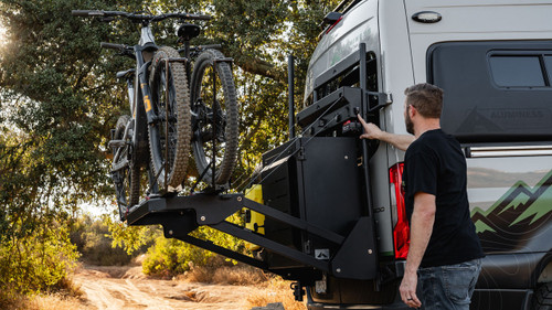 The bike rack in action, being lifted or lowered for convenient access.