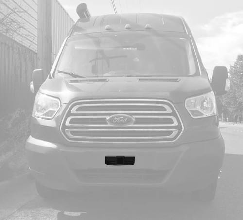 Front view of a Ford Transit van featuring a Receiver Torklift Central.