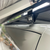 Close-up picture featuring Aluminess Explorer Roof Rack on a beige Mercedes Sprinter van.
