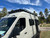 Close-up picture featuring Aluminess Explorer Roof Rack on the top of a Mercedes Sprinter van.
