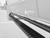 Black powder coated Nerf Bars on a Mercedes Sprinter van.