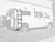 White Chevy Express van with an all-aluminum side ladder from Aluminess Products on the passenger side of the vehicle.