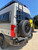 Mercedes Sprinter van featuring Aluminess Rear Door Ladder rack system.
