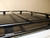 Top view of a Ford E-Series van outfitted with a Weekender Roof Rack from Aluminess Products.