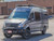 Mercedes Sprinter van outfitted with a Touring Roof Rack from Aluminess Products.