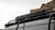 Close-up picture featuring a Fiamma Awning that can be mounted on an Aluminess Explorer Roof Rack.