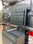 Dodge RAM Promaster with a rear door box and bike rack carrier from Aluminess Products.