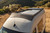 Top-down view of a Sprinter van featuring Aluminess Roof Rack.