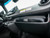 Close-up image inside a Sprinter van featuring the dashboard with a PRP Dash Bag.