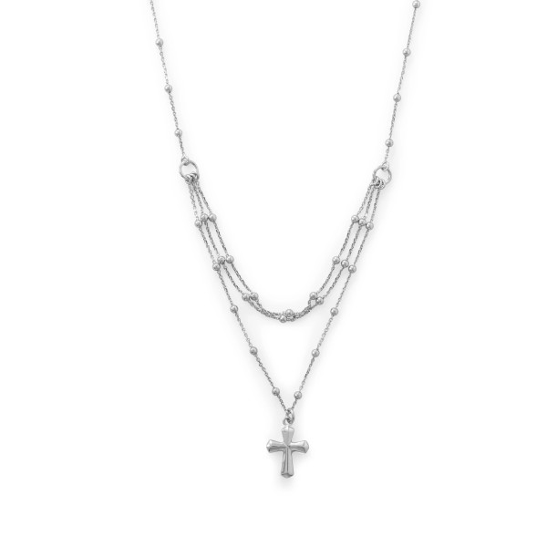 Rhodium plated sterling silver three row cable and bead satellite chain necklace with cross pendant. Double sided cross is 14.1mm x 16.1mm on 1.1mm cable chain with 2.6mm bead stations. Neckline measures 16", longest chain measures 18". Lobster clasp closure.

Made in Italy

.925 Sterling Silver