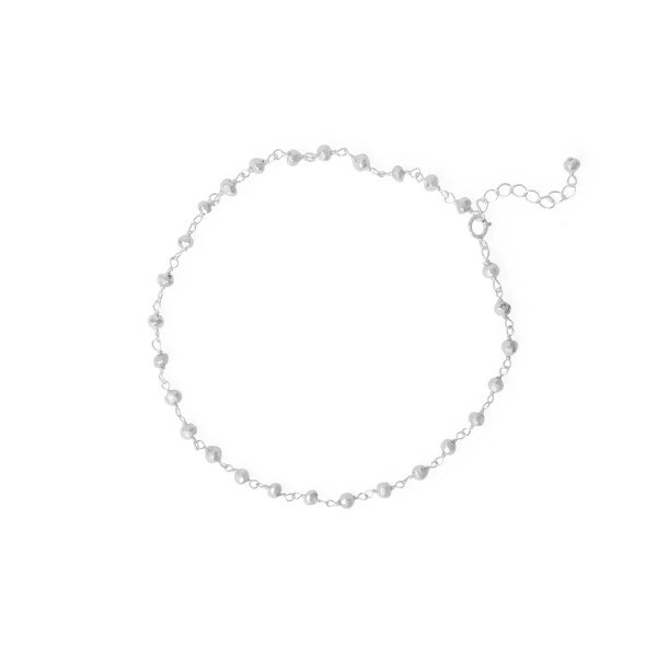 Shine brighter than the sun with this sparkly anklet! 9.5" sterling silver anklet with 1" extension features 3.3mm silver pyrite beads. 

.925 Sterling Silver