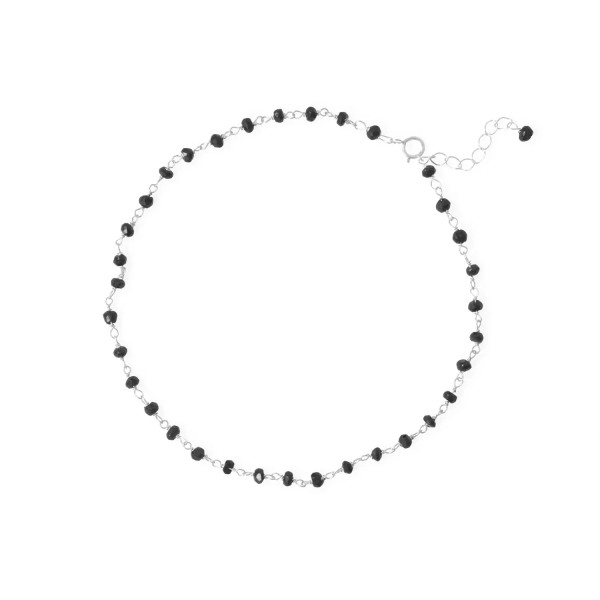Dance in the moonlight, strut your stuff and wear with any and all outfits! 9.5" sterling silver anklet with 1" extension chain features 2.5mm black spinel beads. 

.925 Sterling Silver