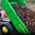 https://salesmanual.deere.com/sales/salesmanual/images/NA/lawn_equipment/features_attachment/utilitycarts/10px_poly_cart_full_dump_lever_450.jpg