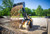 https://www.vermeer.com/getmedia/ab6a0d71-28cd-4b28-9e97-1bf980bc031a/atx850-articulated-loader-unloading-rock?width=670&height=450&ext=.jpg