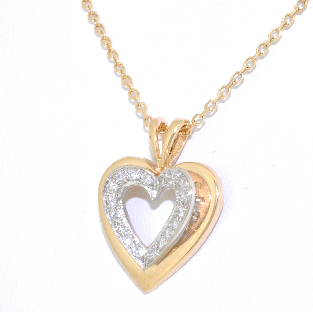 14K Two Tone Gold Diamond Heart Pendant 51001637 | Shin Brothers* 14K Two Tone Gold Diamond Heart Pendant 51001637 | Shin Brothers*