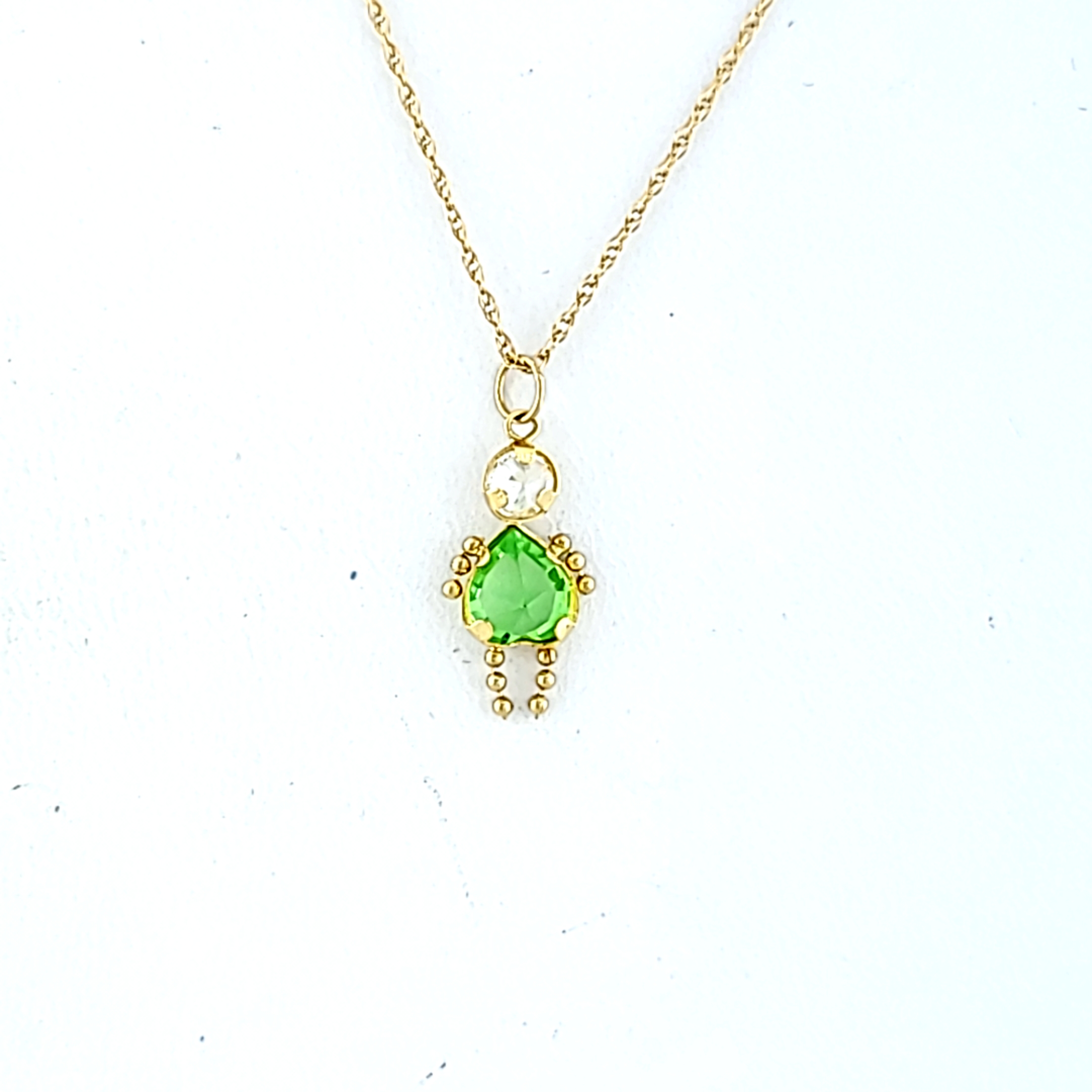 14K Yellow Gold CZ Peridot Girl Charm 52002122 | Shin Brothers* 14K Yellow Gold CZ Peridot Girl Charm 52002122 | Shin Brothers*