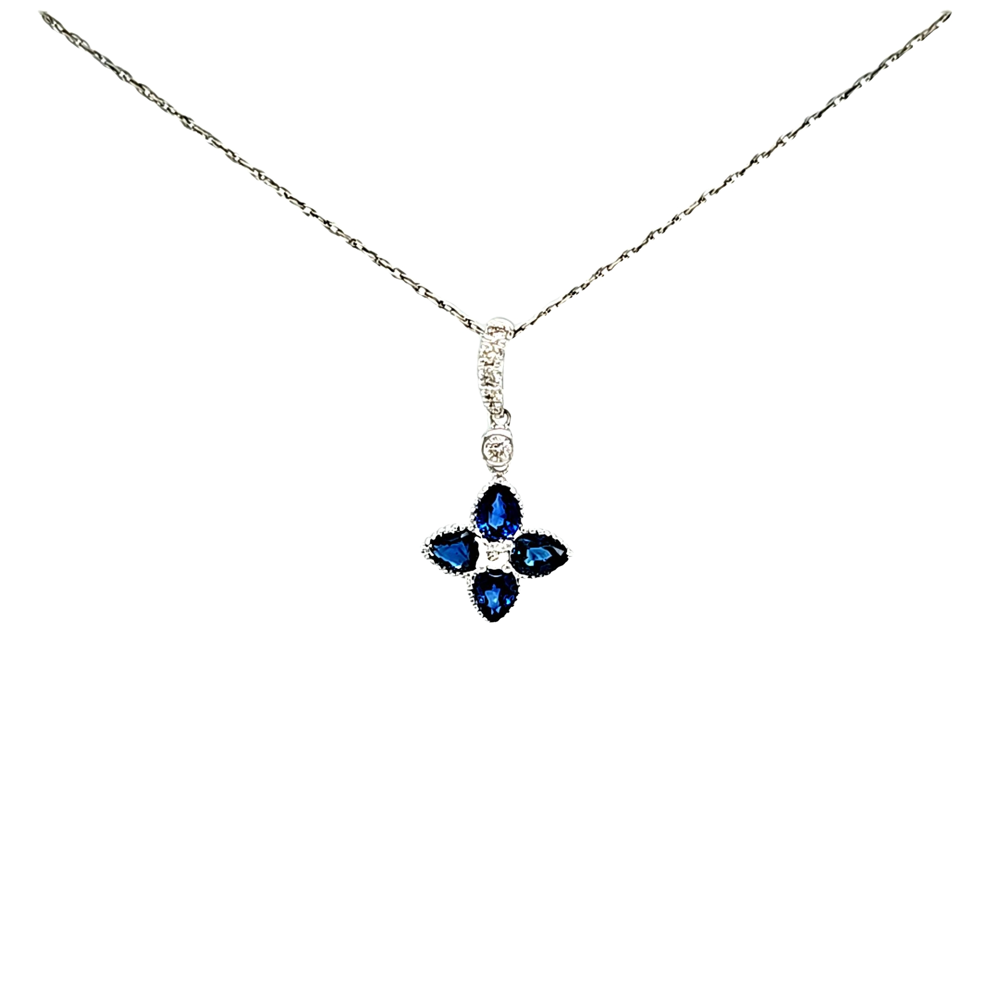 18K Yellow Gold Sapphire Diamond Flower Charm 52002359 | Shin Brothers** 18K Yellow Gold Sapphire Diamond Flower Charm 52002359 | Shin Brothers**