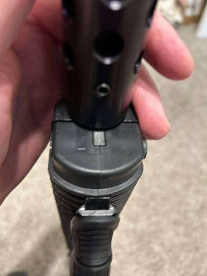 Barrel shroud hole plug