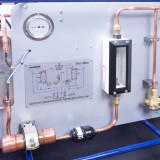 Unità di refrigerazione a compressione di vapore controllata da computer